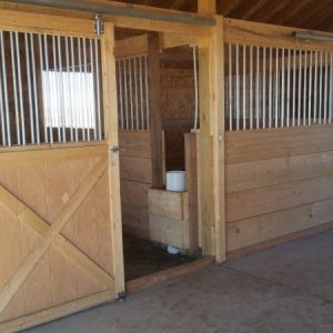 drinking_post_automatic_horse_waterer_installed_between_two_stalls_in_barn